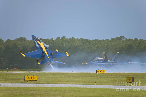 Blue Angels Poster featuring the photograph Blues Solo Takeoff by Tim Mulina