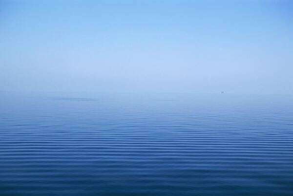 Calm Blue Water Disappearing Into Photograph by Axiom Photographic - Fine  Art America