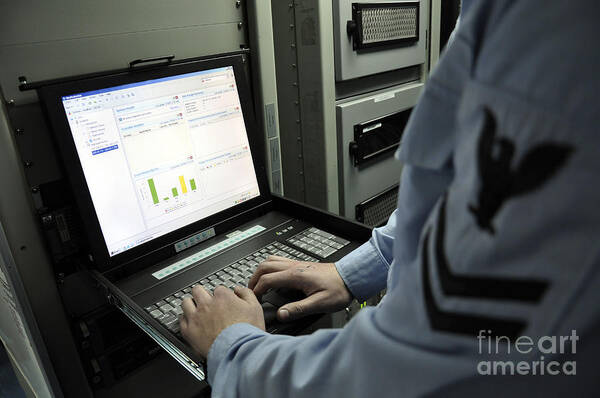 Computer Poster featuring the photograph Information Systems Technician Monitors by Stocktrek Images