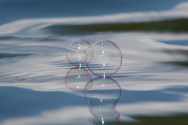 Bubbles Poster featuring the photograph Magic on the Water by Cathie Douglas