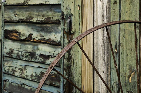 Barn Poster featuring the photograph Outside of an Old Barn by Nancy De Flon