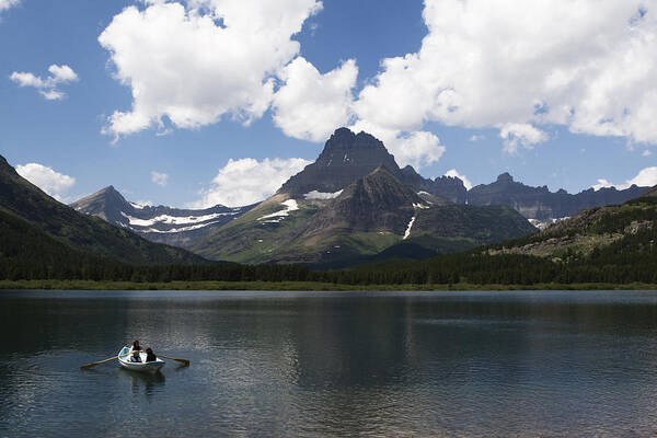 Rowboat Poster featuring the photograph Rowboat at Many Glacier by Lorraine Devon Wilke