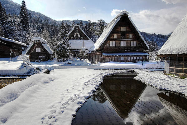 Snow Poster featuring the photograph Snowy village by Kean Poh Chua