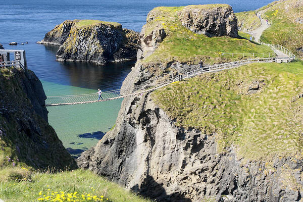 Carrick A Rede Poster featuring the photograph Carrick-a-rede rope bridge Northern Ireland #1 by Pierre Leclerc Photography