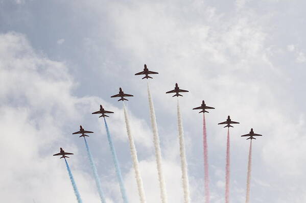 Red Poster featuring the photograph Red arrows #6 by Christopher Rowlands