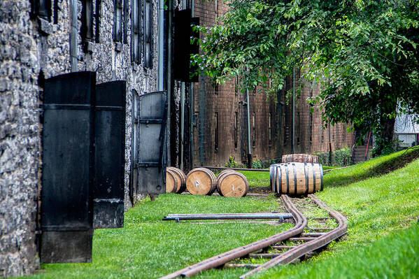 Kentucky Poster featuring the photograph Whiskey Barrels on Rail #1 by John Daly
