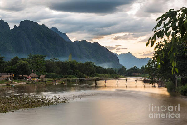 Vang Vieng Poster featuring the photograph Sunset over Vang Vieng river in Laos #2 by Didier Marti