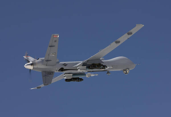 Agm-114 Hellfire Poster featuring the photograph An Mq-9 Reaper Flies A Training Mission #4 by HIGH-G Productions