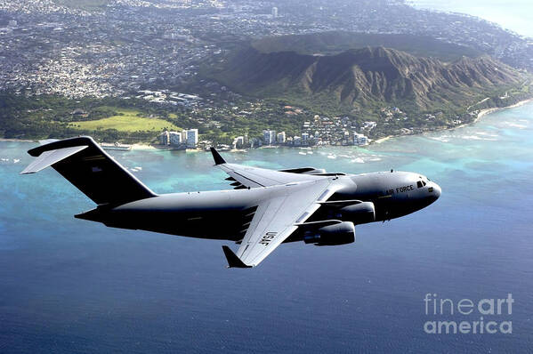 Color Image Poster featuring the photograph A C-17 Globemaster IIi Flies by Stocktrek Images