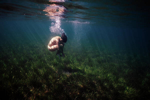 Mermaid Poster featuring the photograph A Mermaid in a Sea of Coral by Gemma Silvestre