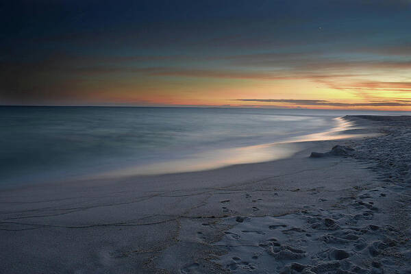 Sunset Poster featuring the photograph A Sandy Shoreline at Sunset by Renee Hardison