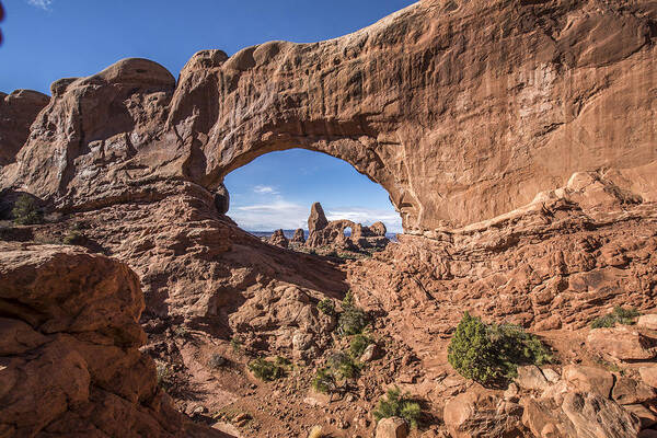 Arches Poster featuring the photograph A Window to More by Jon Glaser