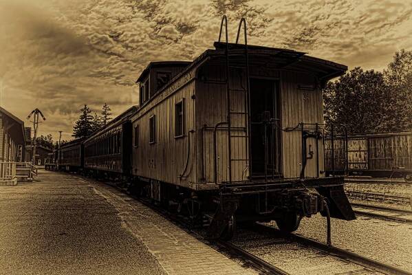 Sepia Poster featuring the photograph Antique Iron Range Caboose by Dale Kauzlaric