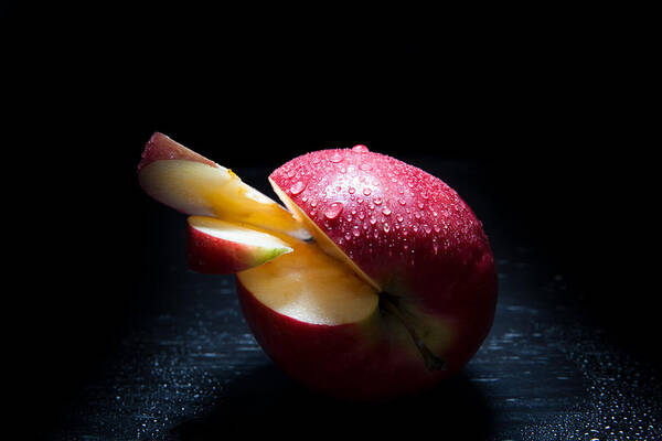 Apple Poster featuring the photograph Apple and drops by Christine Sponchia