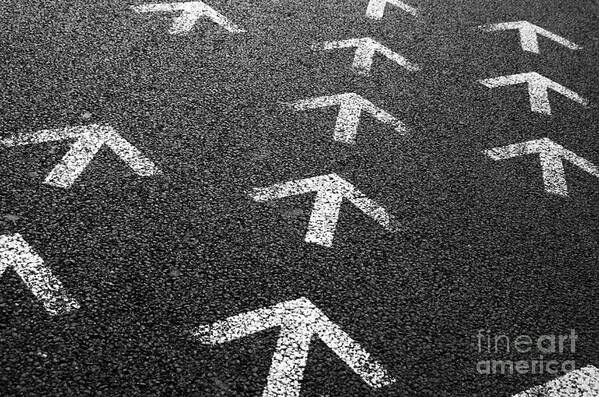 Abstract Poster featuring the photograph Arrows on Asphalt by Carlos Caetano