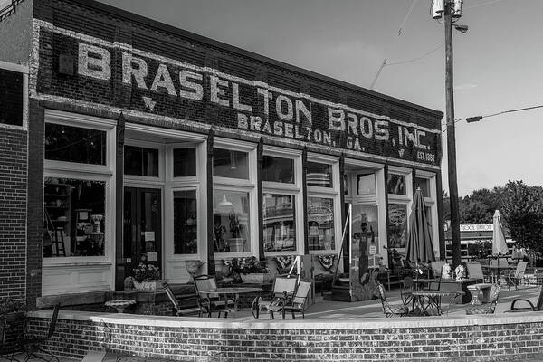 Braselton Poster featuring the photograph Braselton Bros Inc. Store Front in BW by Doug Camara