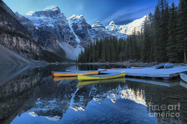 Moraine Lake Poster featuring the photograph Canoes Under The Peaks by Adam Jewell