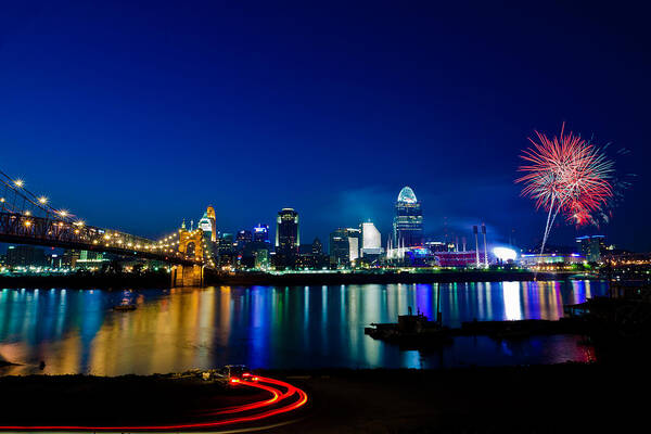 Cincinnati Ohio Skyline Fireworks Twilight Light Trails Water River Reflection Poster featuring the photograph Cincinnati Boom by Keith Allen