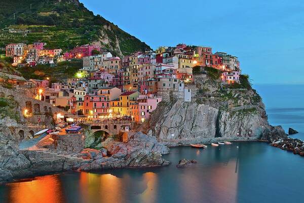 Manarola Poster featuring the photograph Colorful Buildings Colorful Lights by Frozen in Time Fine Art Photography
