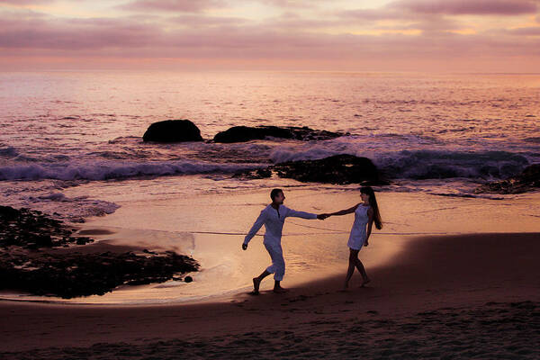 Bushes Poster featuring the photograph Couple at beach at Sunset by Garry Loss