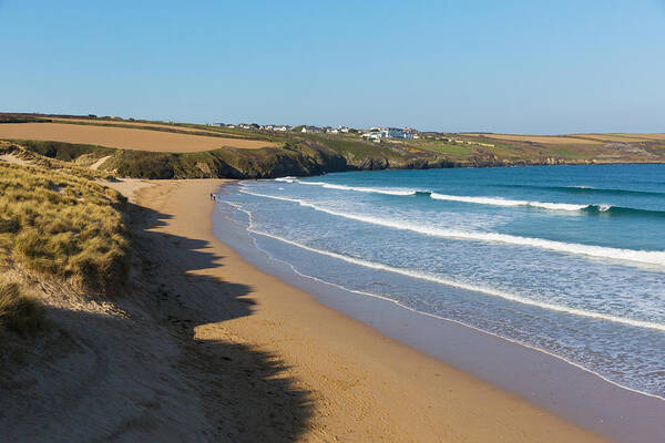 Bowgie Inn Poster featuring the photograph Crantock beach view to West Pentire and Bowgie Inn North Cornwall England UK near Newquay in spring by Charlesy 