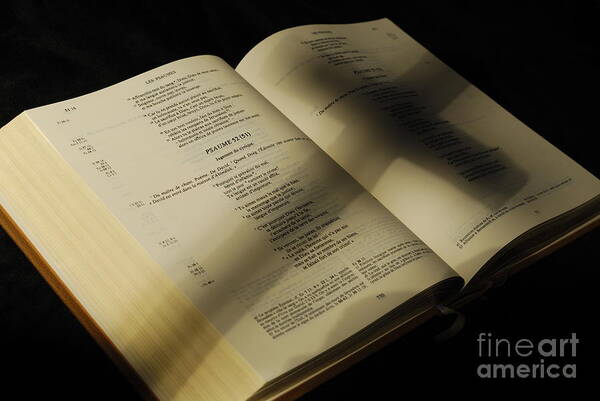 Horizontal Poster featuring the photograph Crucifix shadow on French Holy Bible by Sami Sarkis
