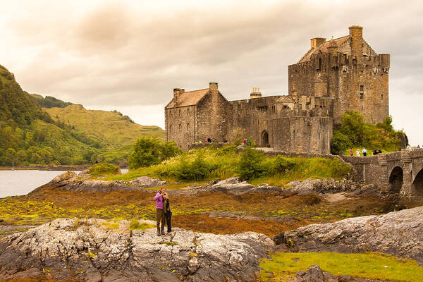 Castle Poster featuring the photograph Donan Castle by Kathleen McGinley