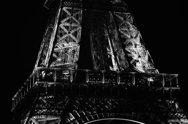 Travelpixpro Poster featuring the photograph Eiffel Tower Illuminated at Night First Floor Deck Paris France Black and White by Shawn O'Brien