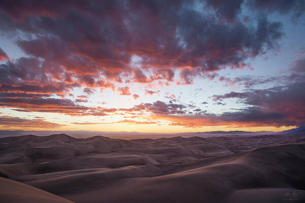 Sunset Poster featuring the photograph Fiery Sunset Over the Dunes by Aaron Spong