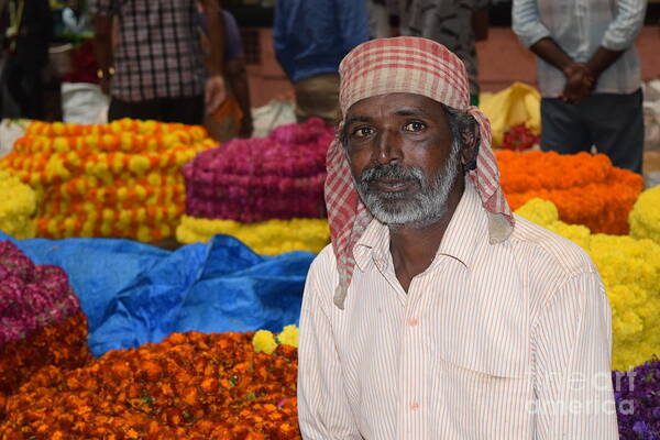 Flower Seller Poster featuring the photograph Flowers for sale by Mini Arora