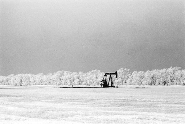 Oil Pump In North Dakota Winter Poster featuring the photograph Frozen Oil Field by William Kimble