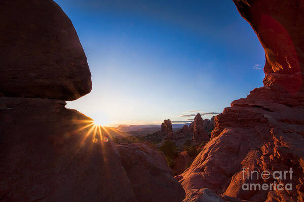 Arches National Park Poster featuring the photograph Here Comes the Sun by Jim Garrison