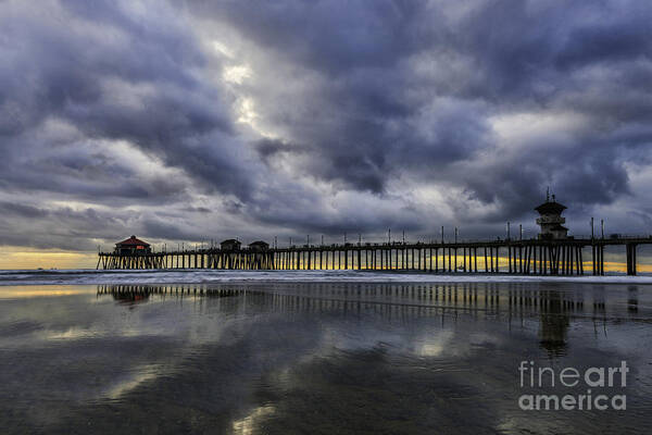 Beach Poster featuring the photograph Huntington Beach Pier Sunset with Reflections by Peter Dang