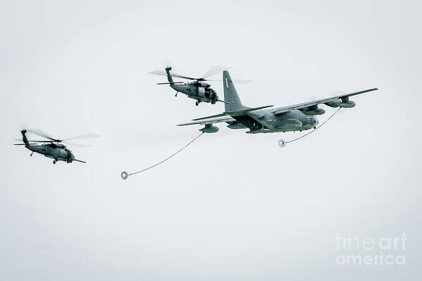 C-130 Tanker Fueling Sikorsky Blackhawk Helicopter Poster featuring the photograph Joining Up for In Flight Refueling by Rene Triay FineArt Photos