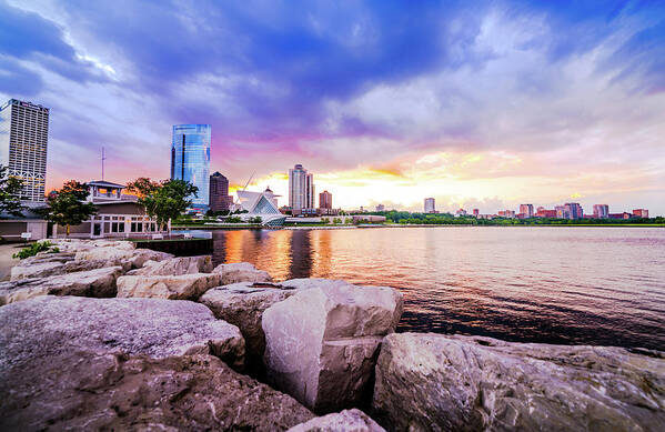Lakefront Poster featuring the photograph Lakefront Sunset on Rocks by Vincent Buckley