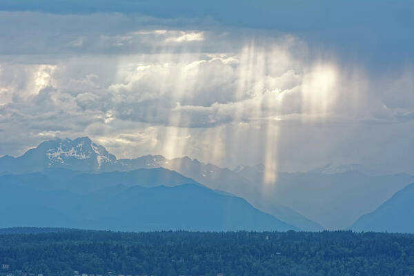 Landscape. Mountains Poster featuring the photograph Light through clouds by Peter Ponzio