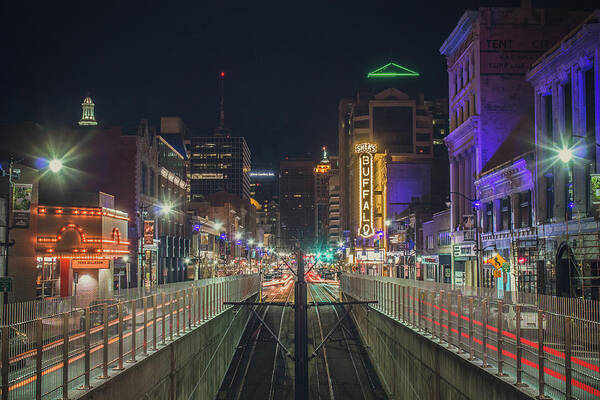 Buffalo Poster featuring the photograph Looking south on Main Street in Buffalo at night by Jay Smith