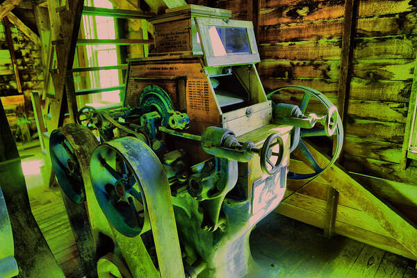 Machinery Poster featuring the photograph Machinery in an old grist mill by Jeff Swan