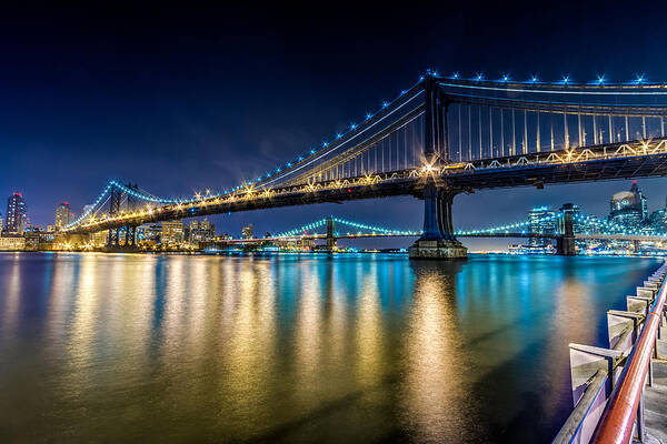 Downtown Poster featuring the photograph Manhattan and Brooklyn Bridges at night. by Val Black Russian Tourchin
