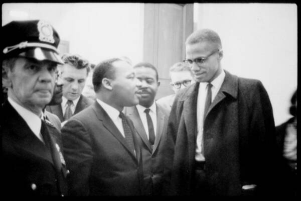 1960s Poster featuring the photograph Martin Luther King Jr., And Malcolm X by Everett