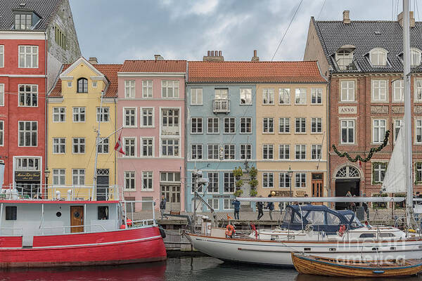 Copenhagen Poster featuring the photograph Nyhavn Waterfront in Copenhagen by Antony McAulay