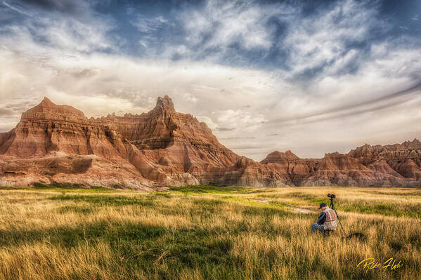 Natural Forms Poster featuring the photograph Photographer waiting for the Badlands Light by Rikk Flohr