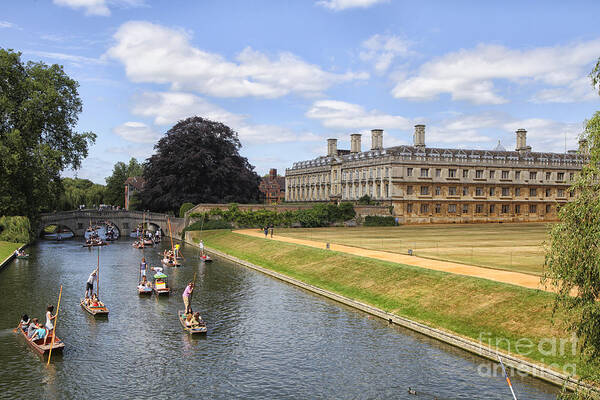 Punting Poster featuring the photograph Punter boats passing King's college in Cambridge by Patricia Hofmeester