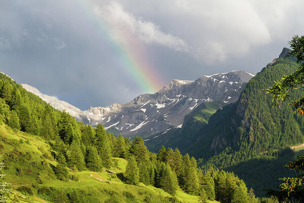 Mountain Landscape Poster featuring the photograph Rainbow over the mountains by Paul MAURICE