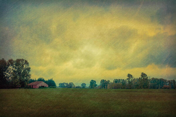 Barn Poster featuring the photograph Red Barn Under Stormy Skies by Don Schwartz