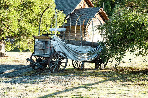 Sagging Conestoga Many Miles Poster featuring the photograph Sagging Conestoga Many Miles by Tom Cochran