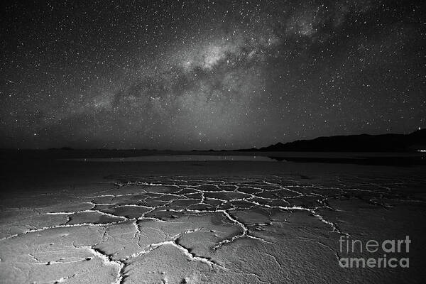 Astrophotography Poster featuring the photograph Salar de Uyuni Textures and Milky Way in Monochrome Bolivia by James Brunker