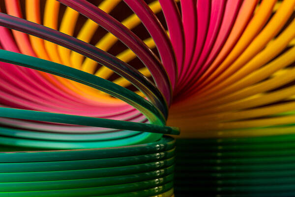 Toy Poster featuring the photograph Slinky III by Bob Cournoyer