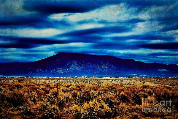 Stormy Poster featuring the photograph Stormy day in Taos by Charles Muhle