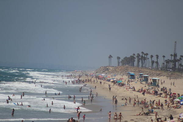 Beach Scene Poster featuring the photograph Summer Fun at Huntington Beach by Colleen Cornelius